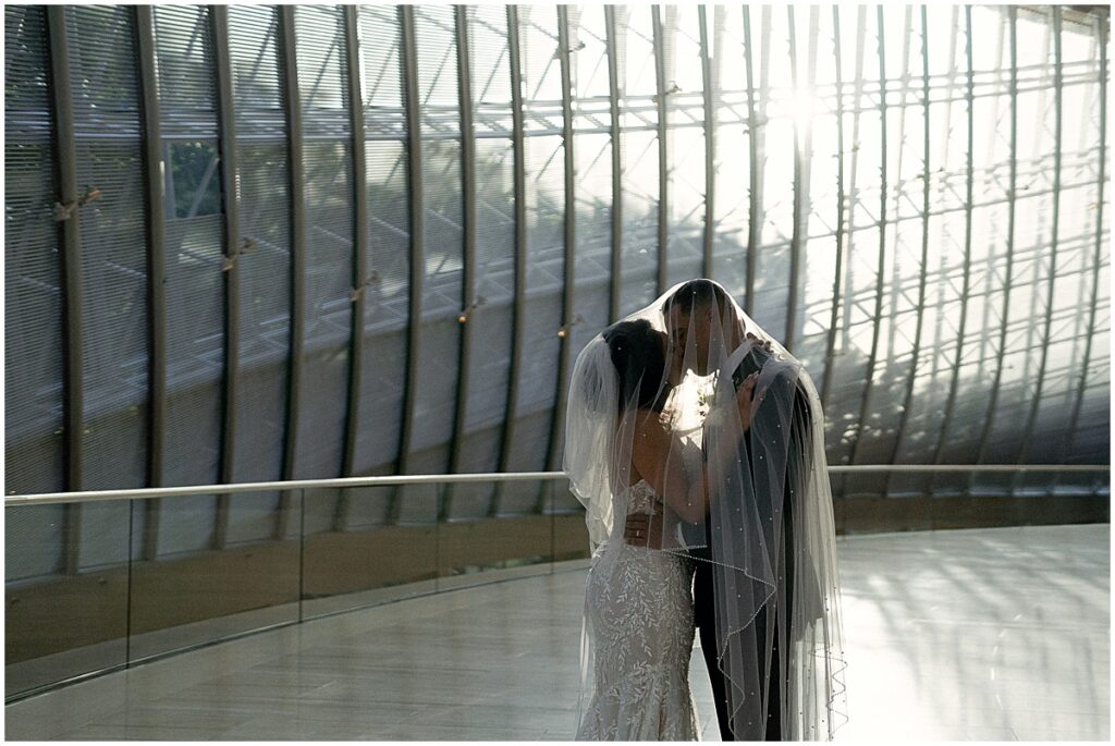 Bride and groom portraits under the veil at Dallas Meyerson Symphony Center Wedding