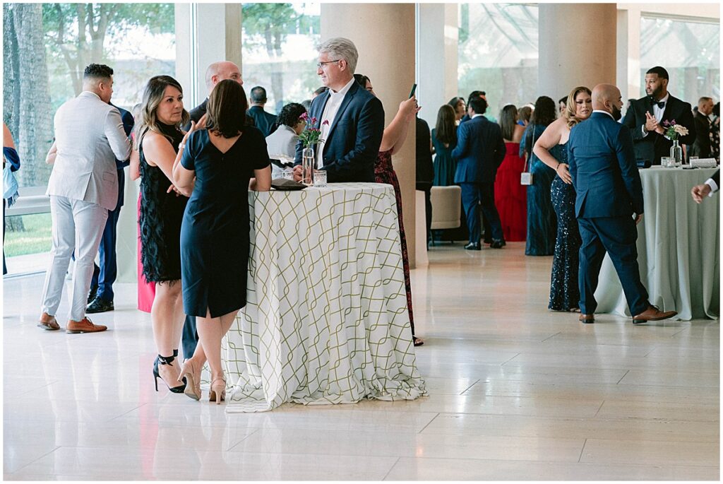 Wedding guests at cocktail hour at Dallas Meyerson Symphony Center Wedding