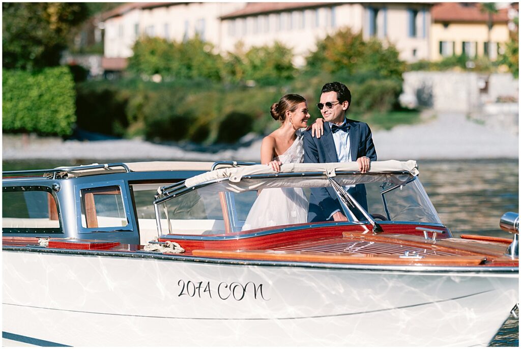 Bride and groom on a boat on Lake Como for elopement wedding