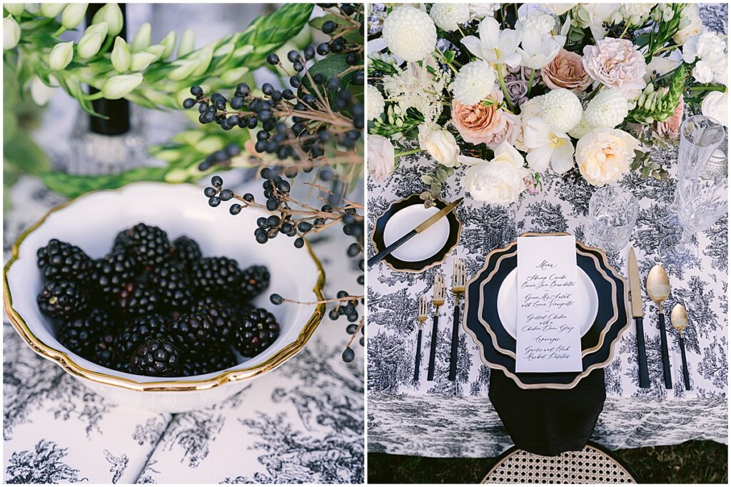 Blackberries in a bowl, wedding table setting including black and white linens, plates with gold accents.